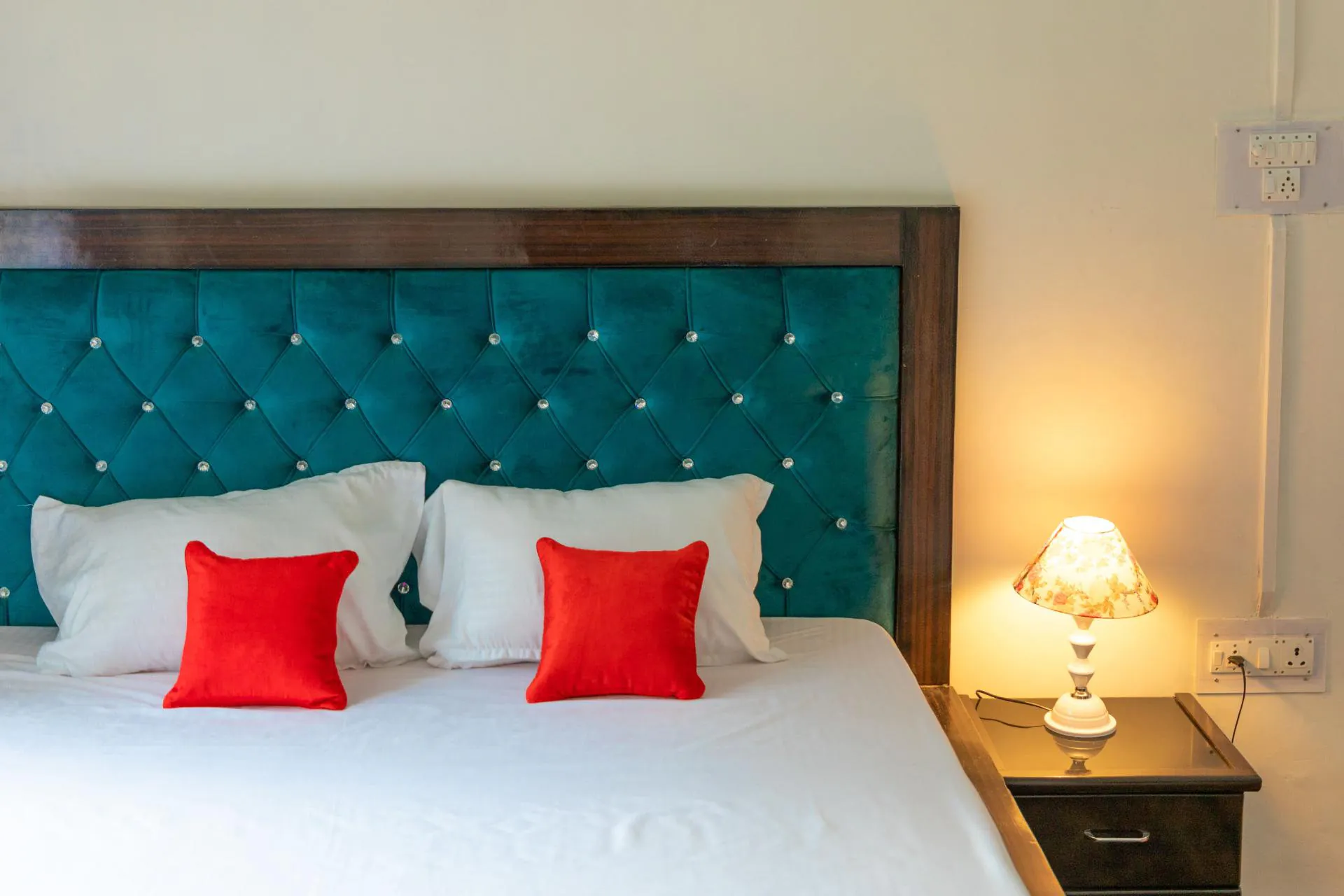 Neat and clean bedroom of garden view 1BHK Apartment
