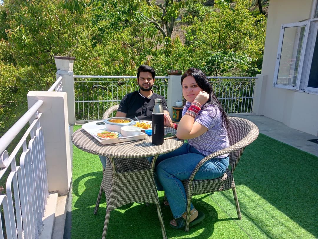 Guest having freshly prepared homemade food at Mohija Homestay
