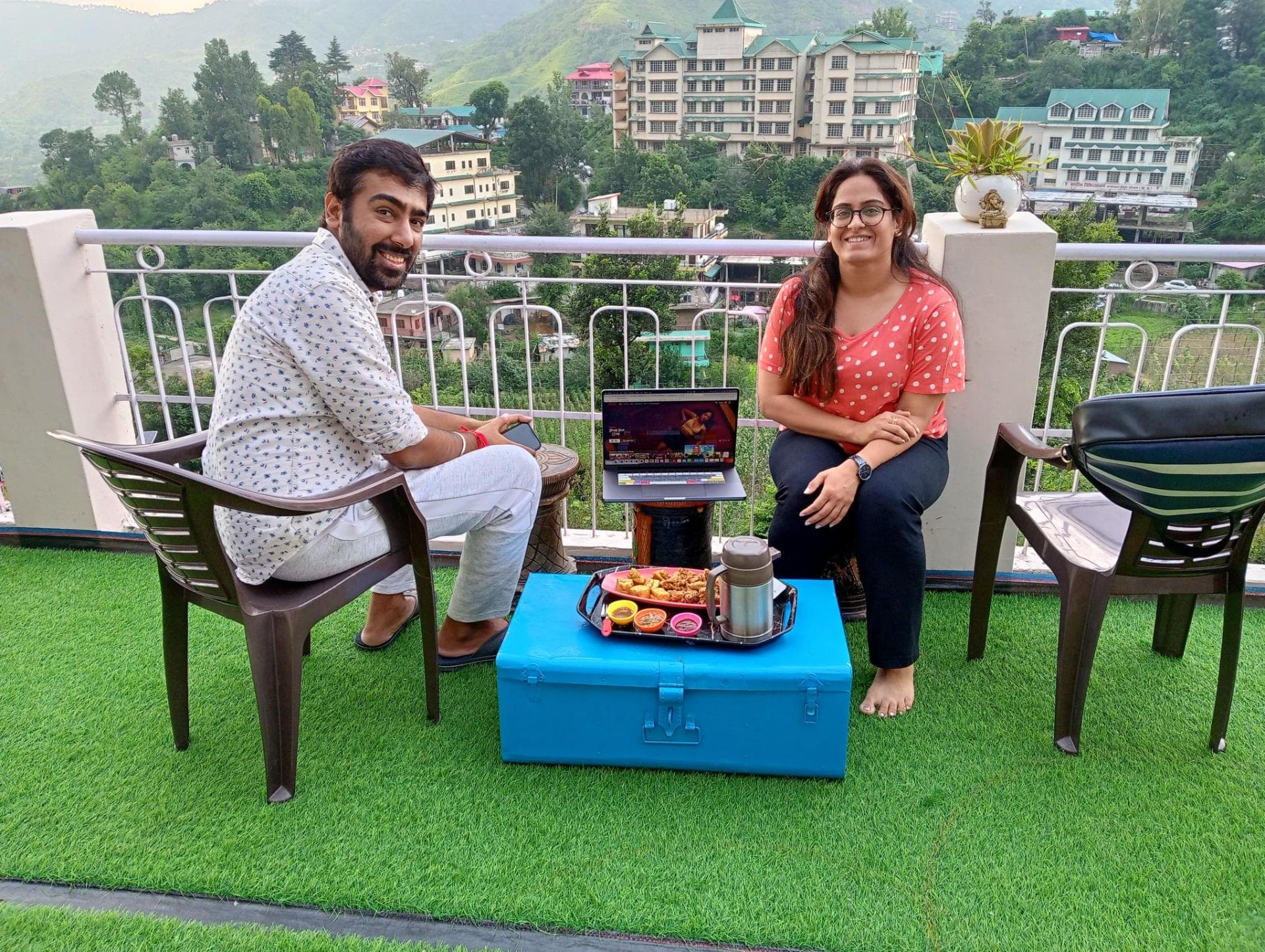 Guests enjoying a movie with snacks on the terrace at Mohija Homestay